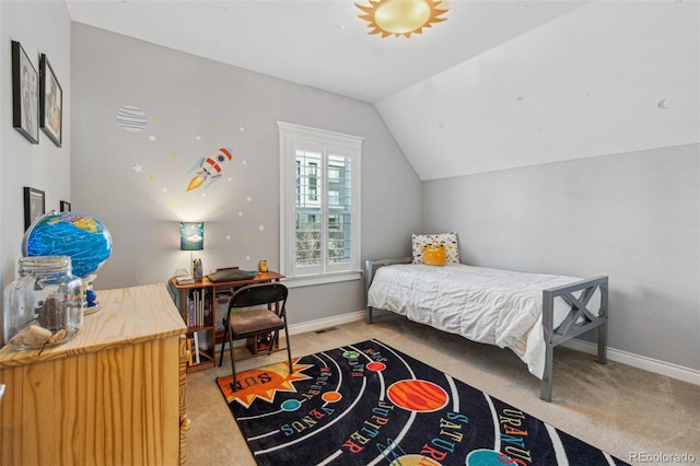 carpeted bedroom featuring lofted ceiling, visible vents, and baseboards