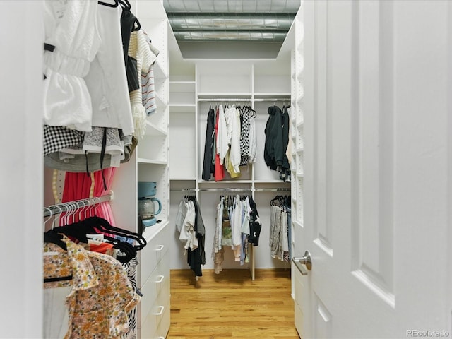 1499 Blake St Unit 3U, Denver, CO 80202 - walk in closet featuring light wood-style floors