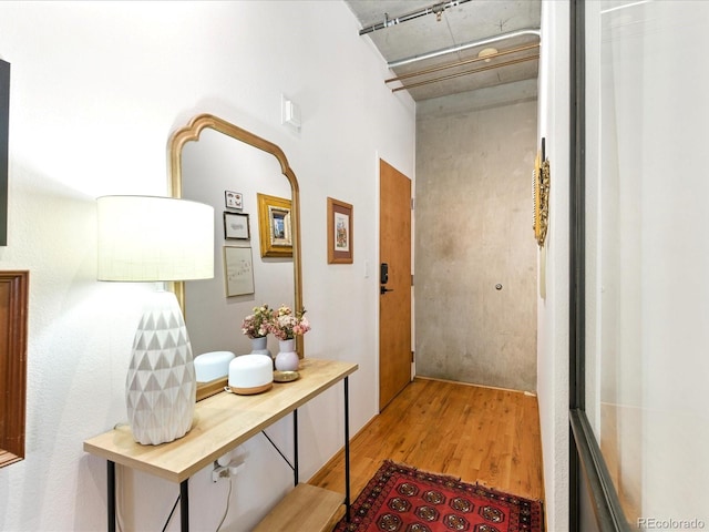 1499 Blake St Unit 3U, Denver, CO 80202 - corridor with wood finished floors