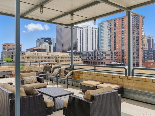 1499 Blake St Unit 3U, Denver, CO 80202 - view of patio with a skyline view, an outdoor living space, and a balcony