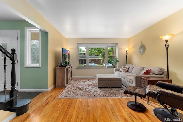 6906 S Sycamore St, Littleton, CO 80120 - living area with light wood-type flooring and baseboards