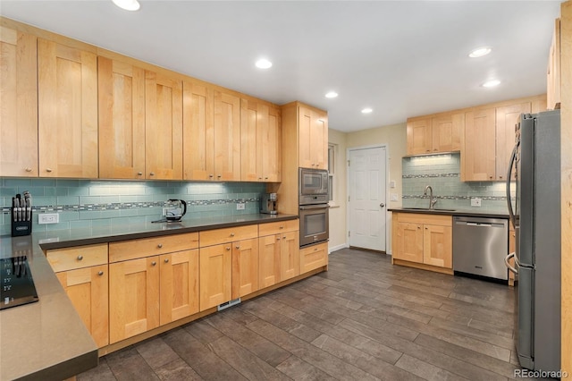 6906 S Sycamore St, Littleton, CO 80120 - kitchen featuring appliances with stainless steel finishes, light brown cabinetry, tasteful backsplash, dark wood finished floors, and recessed lighting