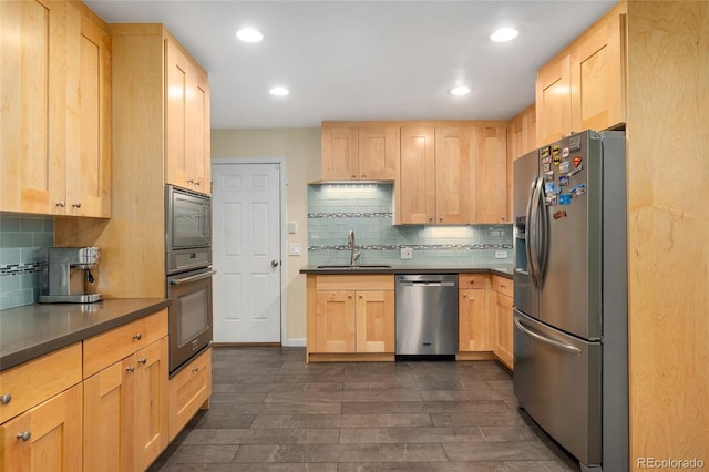 6906 S Sycamore St, Littleton, CO 80120 - kitchen with appliances with stainless steel finishes, light brown cabinetry, dark wood-style floors, dark countertops, and recessed lighting