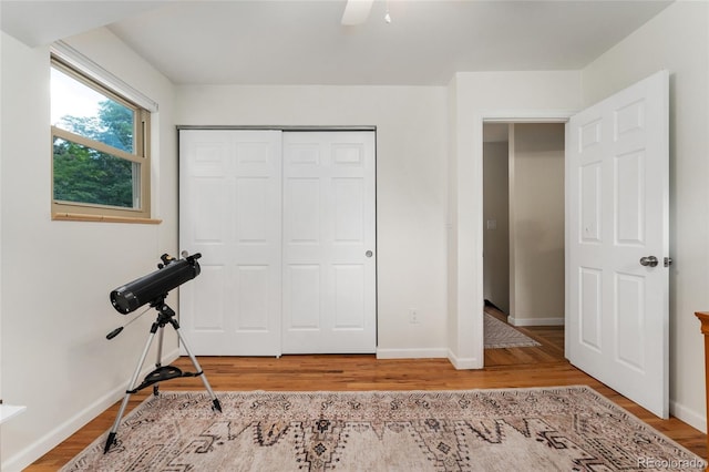 6906 S Sycamore St, Littleton, CO 80120 - exercise room featuring wood finished floors and ceiling fan