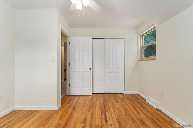 6906 S Sycamore St, Littleton, CO 80120 - unfurnished bedroom with light wood-style flooring, a closet, and a ceiling fan