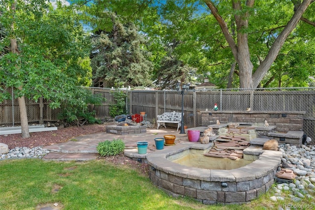 6906 S Sycamore St, Littleton, CO 80120 - fenced backyard featuring a patio area