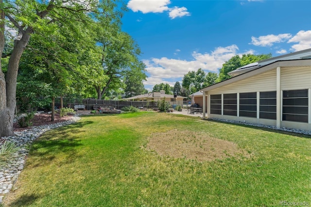 6906 S Sycamore St, Littleton, CO 80120 - fenced backyard featuring a patio