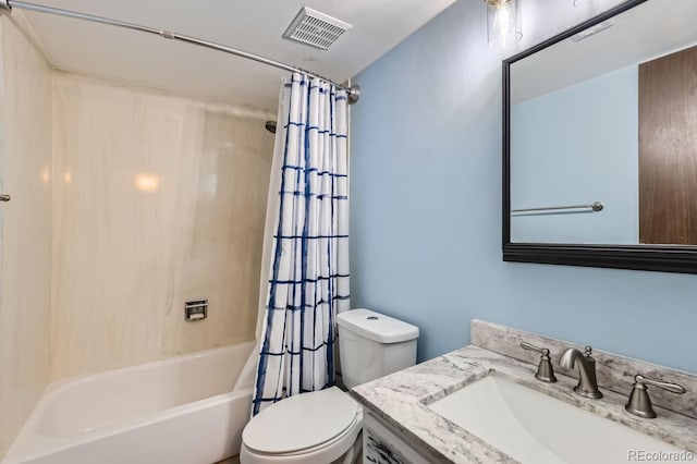 full bathroom with shower / tub combo with curtain, vanity, and toilet