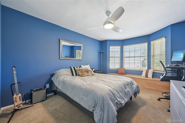 12655 E Pacific Cir Unit C, Aurora, CO 80014 - bedroom with carpet flooring, a textured ceiling, and a ceiling fan