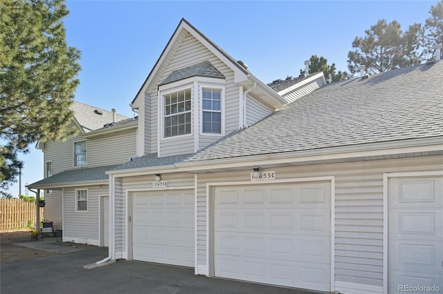 12655 E Pacific Cir Unit C, Aurora, CO 80014 - garage featuring asphalt driveway