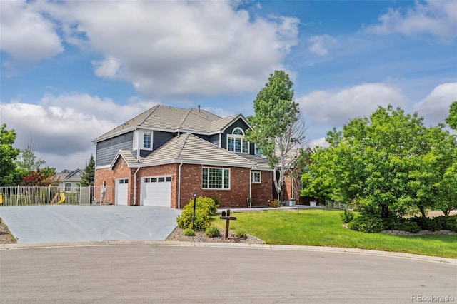 7119 S Riviera St, Aurora, CO 80016 - traditional-style home featuring brick siding, concrete driveway, and a tile roof