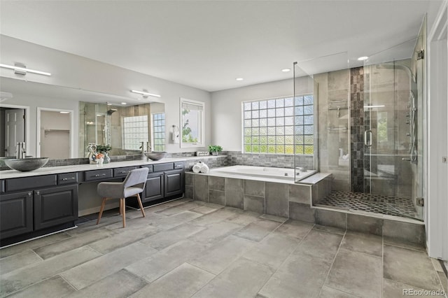 7119 S Riviera St, Aurora, CO 80016 - full bath featuring double vanity, a bath, a shower stall, and recessed lighting