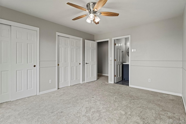 7119 S Riviera St, Aurora, CO 80016 - unfurnished bedroom with two closets, carpet, connected bathroom, and ceiling fan