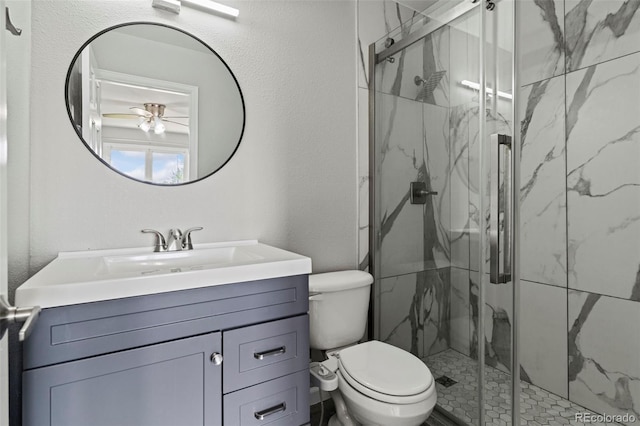 7119 S Riviera St, Aurora, CO 80016 - bathroom with vanity, a marble finish shower, and ceiling fan