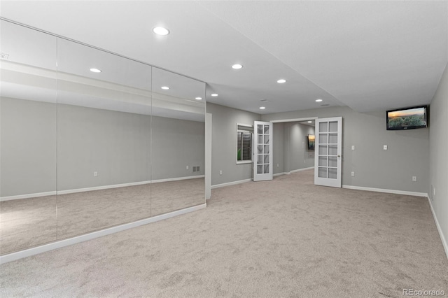 7119 S Riviera St, Aurora, CO 80016 - below grade area featuring carpet flooring, french doors, and recessed lighting