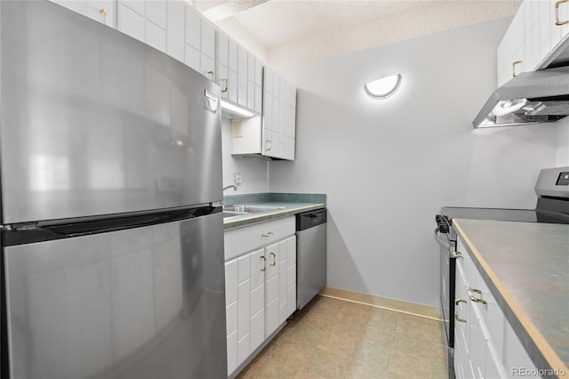1265 N Race St Unit 603, Denver, CO 80206 - kitchen with stainless steel appliances, under cabinet range hood, white cabinets, and a textured ceiling