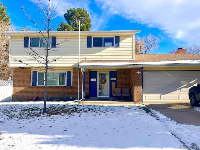 view of front of property with a garage