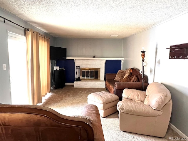 carpeted living room with a textured ceiling