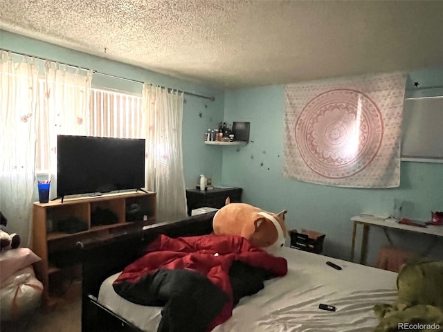 bedroom with a textured ceiling