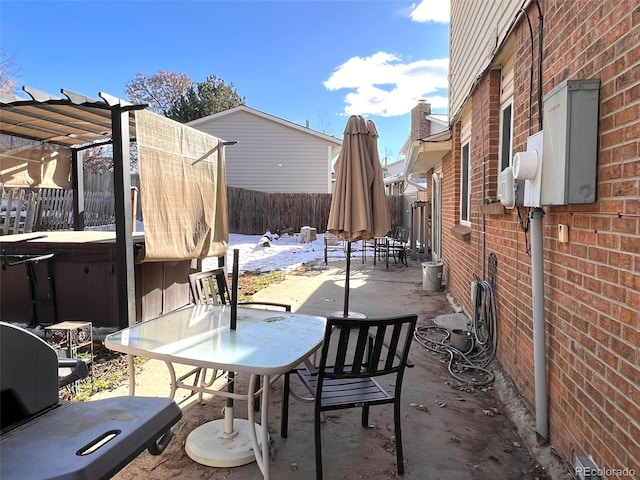 view of patio featuring a pergola and a hot tub