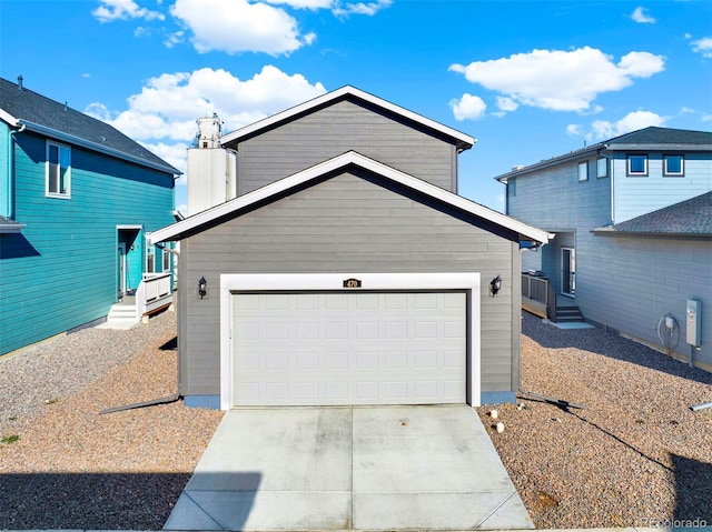 front of property with a garage