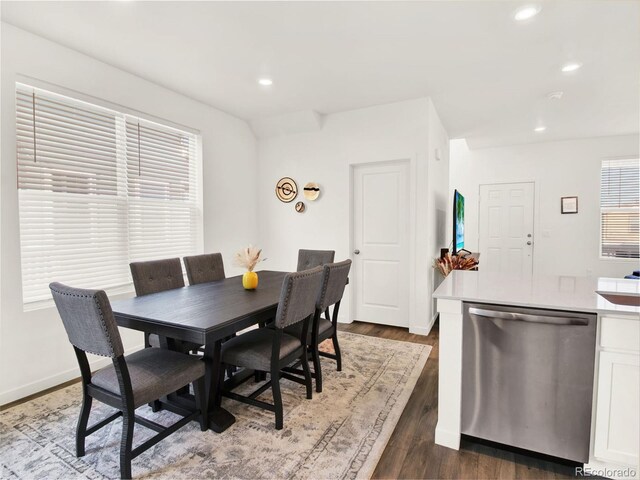 dining room with dark hardwood / wood-style floors