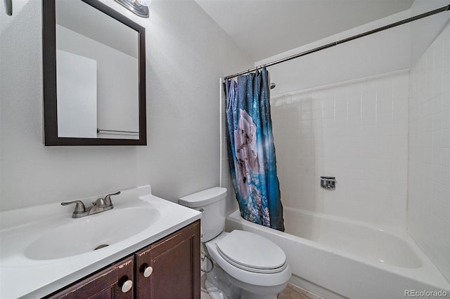 full bathroom featuring toilet, vanity, and shower / bath combo