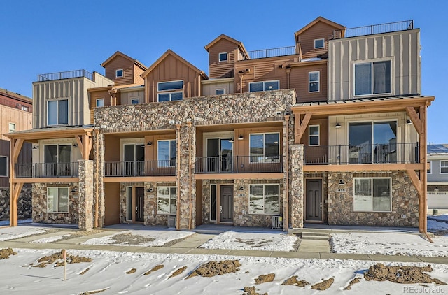 view of snow covered property