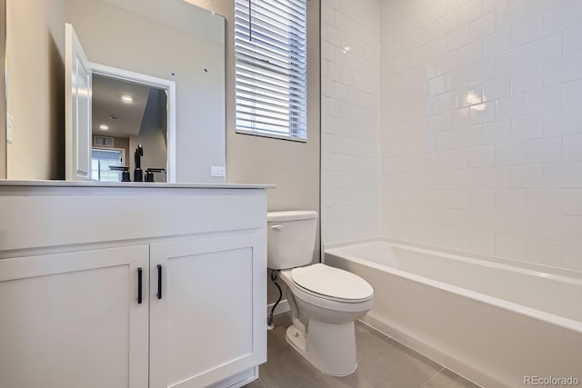 full bathroom featuring vanity, toilet, tile patterned flooring, and shower / bathing tub combination