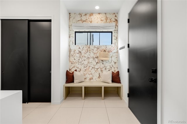 1001 S Adams St, Denver, CO 80209 - mudroom with tile patterned flooring and baseboards