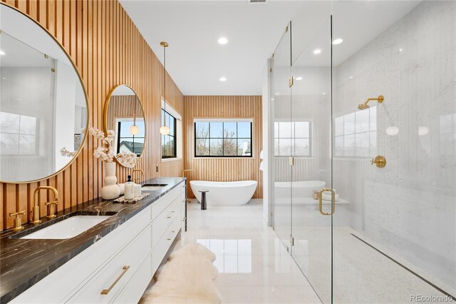 1001 S Adams St, Denver, CO 80209 - full bath with a shower stall, a freestanding tub, and double vanity
