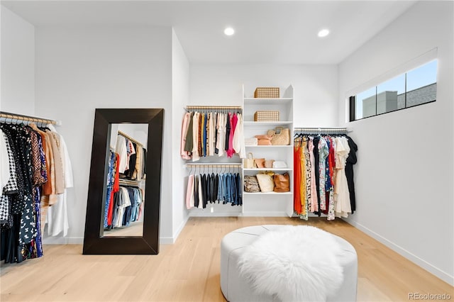 1001 S Adams St, Denver, CO 80209 - walk in closet featuring wood finished floors