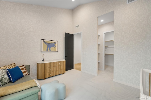 1001 S Adams St, Denver, CO 80209 - sitting room featuring wallpapered walls, baseboards, and light carpet