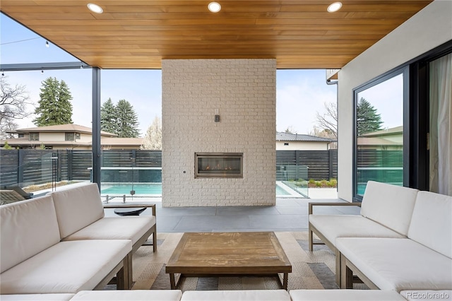 1001 S Adams St, Denver, CO 80209 - view of patio / terrace with an outdoor hangout area, a fenced backyard, and a swimming pool
