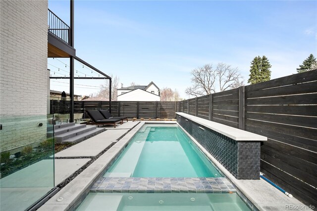 1001 S Adams St, Denver, CO 80209 - view of swimming pool featuring a fenced backyard