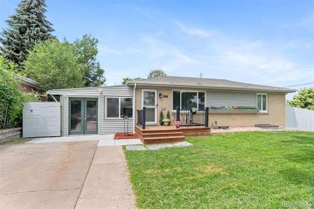 995 Ironton St, Aurora, CO 80010 - view of front of house featuring brick siding and french doors