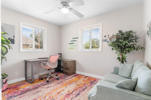 995 Ironton St, Aurora, CO 80010 - office area featuring healthy amount of natural light and a ceiling fan