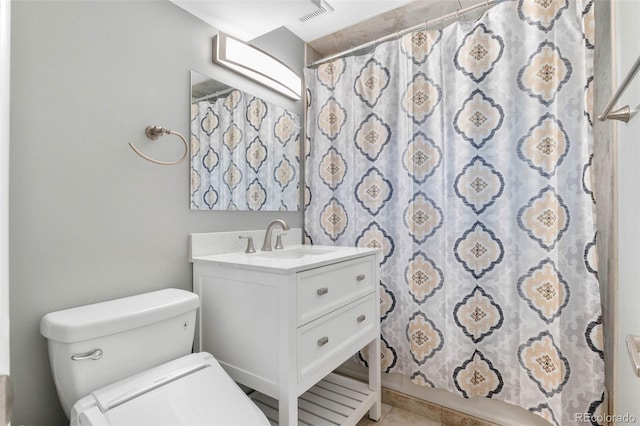 995 Ironton St, Aurora, CO 80010 - bathroom with vanity, a shower with shower curtain, and tile patterned flooring
