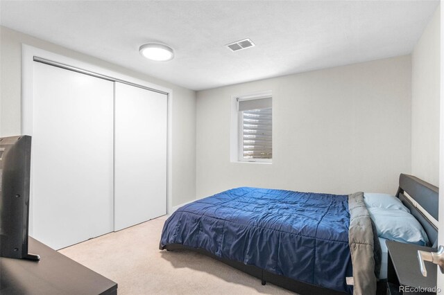 995 Ironton St, Aurora, CO 80010 - bedroom with carpet flooring and a closet