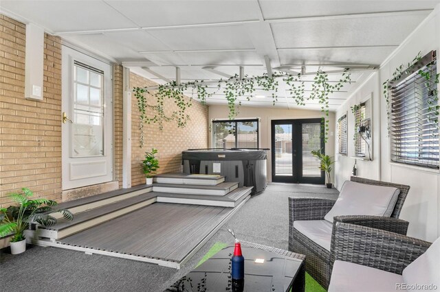 995 Ironton St, Aurora, CO 80010 - sunroom with a jacuzzi, plenty of natural light, and french doors