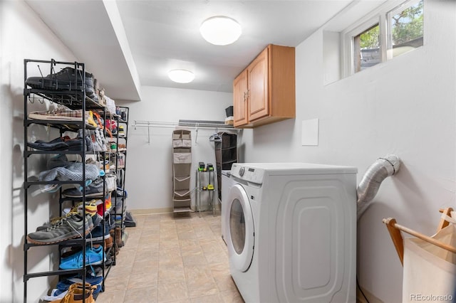 995 Ironton St, Aurora, CO 80010 - washroom with cabinet space and washer and dryer