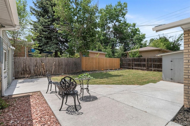 995 Ironton St, Aurora, CO 80010 - fenced backyard featuring a patio