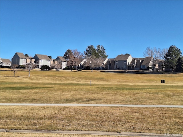 view of yard featuring a residential view