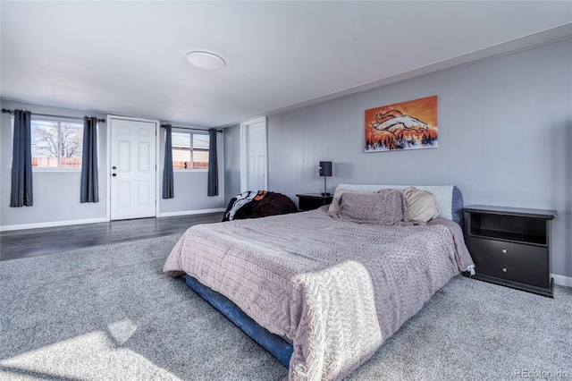 bedroom with wood-type flooring