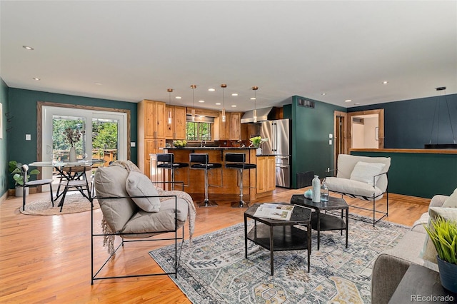 15 Pawnee Dr, Boulder, CO 80303 - living area with healthy amount of natural light, recessed lighting, and light wood-style floors
