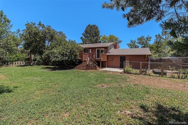 15 Pawnee Dr, Boulder, CO 80303 - back of house featuring a wooden deck, stairway, and a patio area