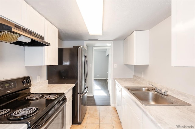 kitchen featuring light tile patterned flooring, sink, white cabinetry, black / electric stove, and range hood