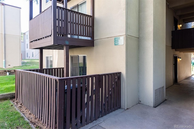 view of home's exterior with a balcony