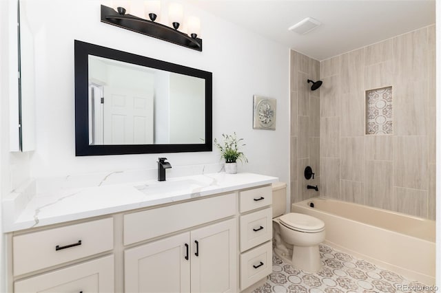 bathroom with vanity, toilet, and shower / washtub combination