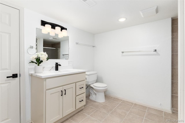 full bathroom featuring vanity, visible vents, tile patterned flooring, a shower stall, and toilet